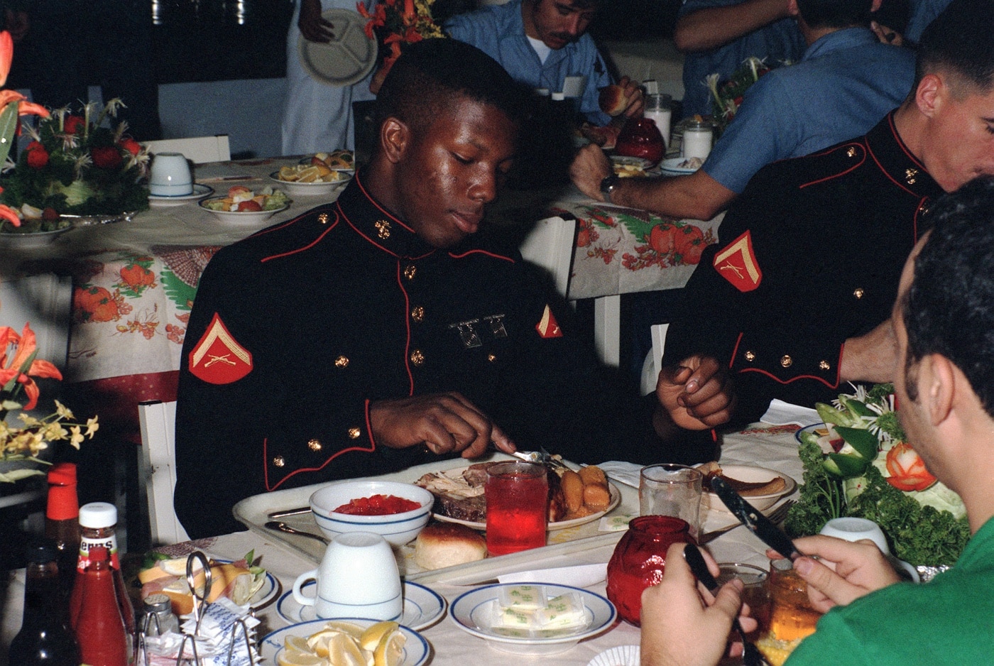 US Marine eats Thanksgiving dinner on USS Carl Vinson