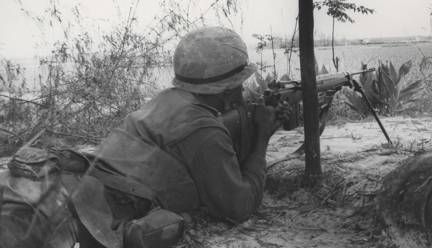 US Marine fires M-14 rifle near Trung Kieu Vietnam War