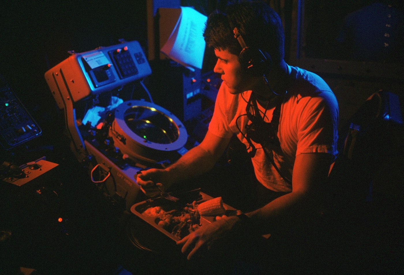 US Navy sailor eats Thanksgiving meal on USS Okinawa LPH-3 in 1987