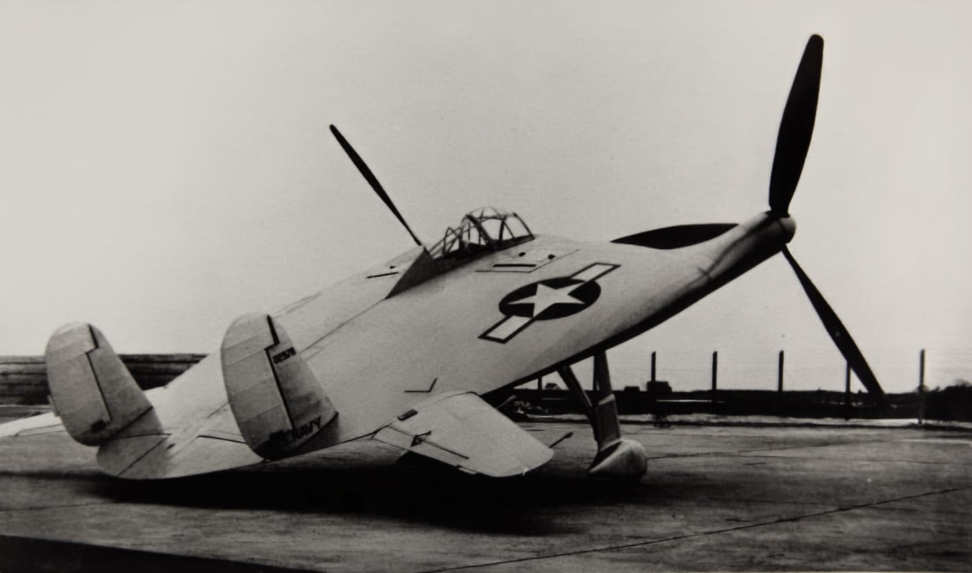 Vought V-173 with fixed landing gear and nose up angle on runway