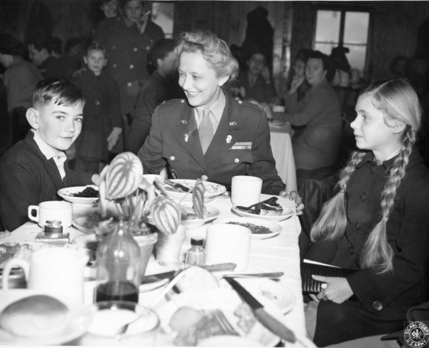 Women's Army Corps Thanksgiving dinner with German war orphans