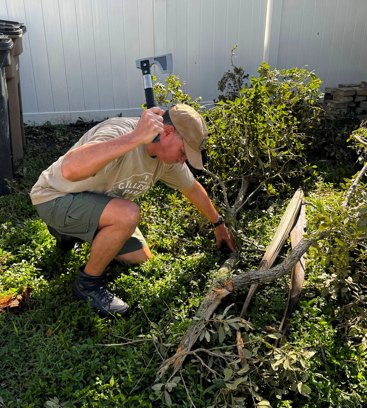 author cleaning up Hurricane Milton debris with the SOG camping axe