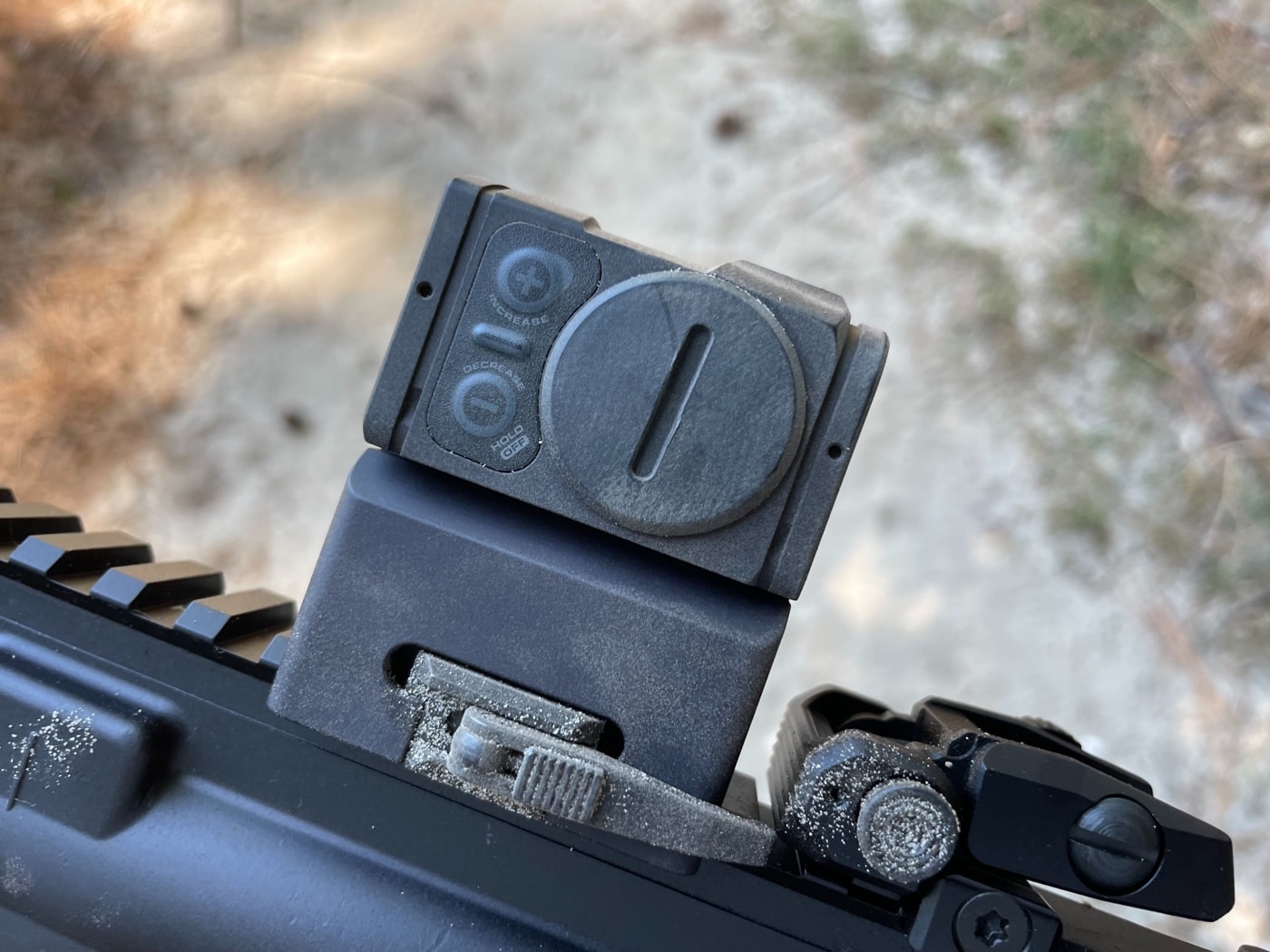 battery compartment of Aimpoint ACRO P2 red dot sight