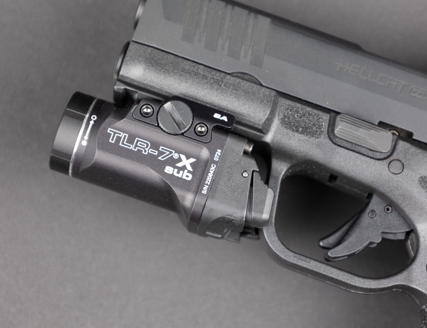 mounting the Streamlight TLR-7X Sub USB tactical flashlight on a pistol