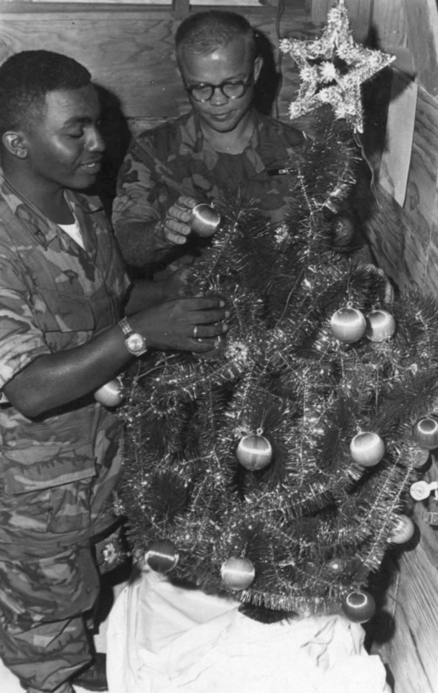 Marines decorate a Christmas tree near Danang Vietnam