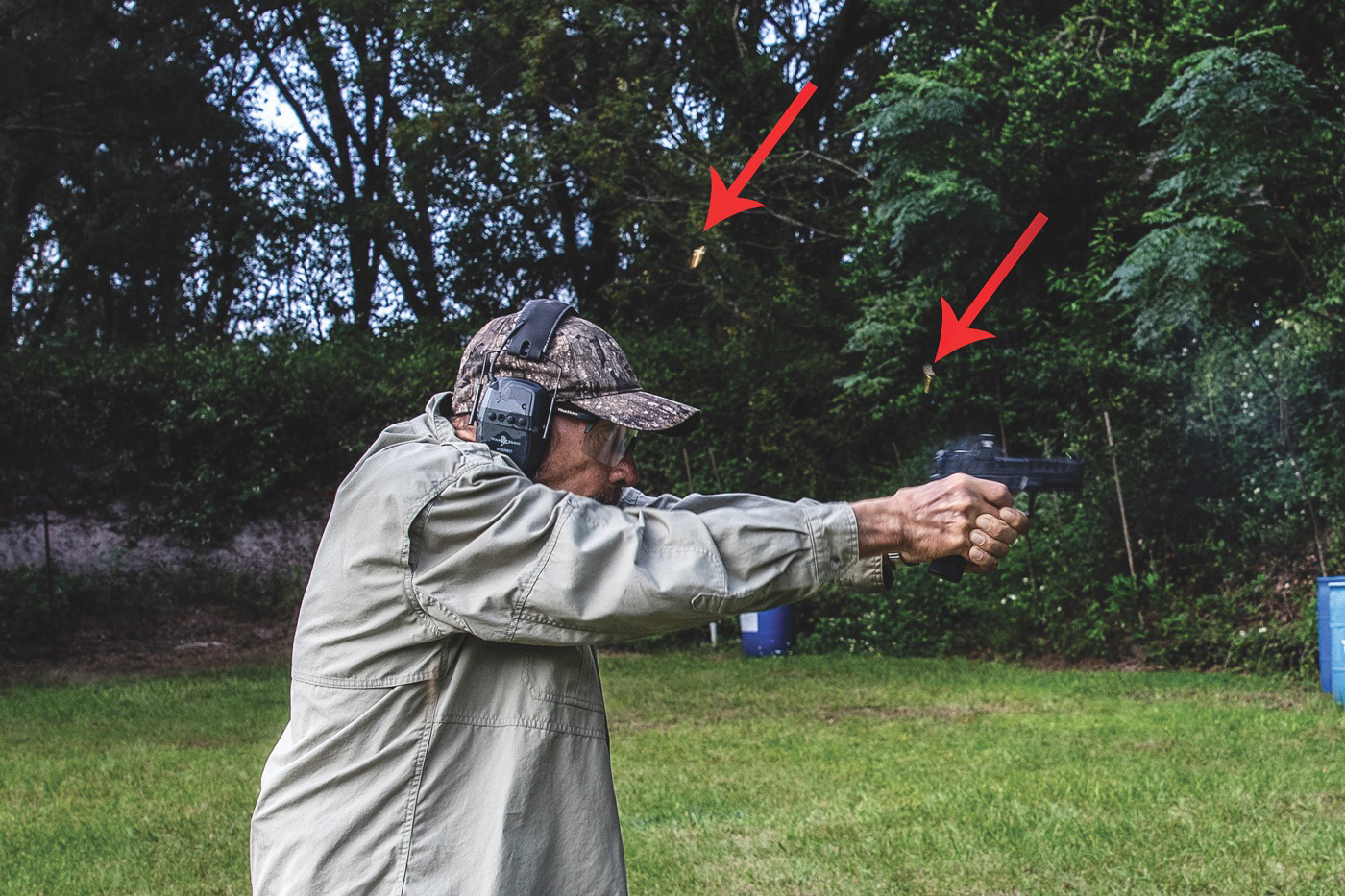 Massad Ayoob fires the Springfield Armory Echelon 4.0C compact 9mm pistol, with spent brass visible mid-air, demonstrating the firearm’s rapid shooting capability, low recoil, and exceptional control in action.