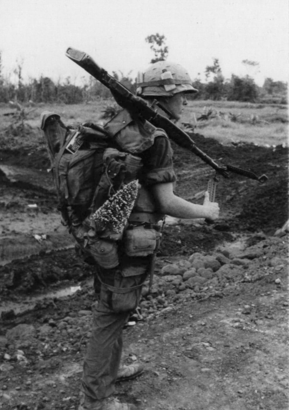 USMC Pfc Frank Bunton on patrol in Vietnam War with Christmas tree 1967 Con Thien