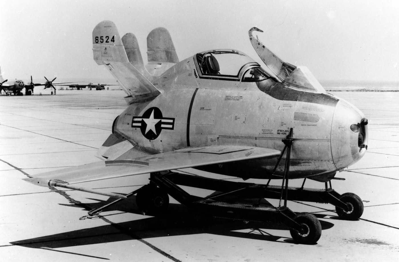 This image features the second McDonnell XF-85 Goblin built for testing and development. The aircraft's compact fuselage and short wings are clearly visible, showcasing its role as a parasite fighter meant to be carried by bombers. This second prototype was critical for refining the design and handling of the innovative jet during experimental flights. The photo highlights the engineering challenges and ambition of late 1940s aviation research.