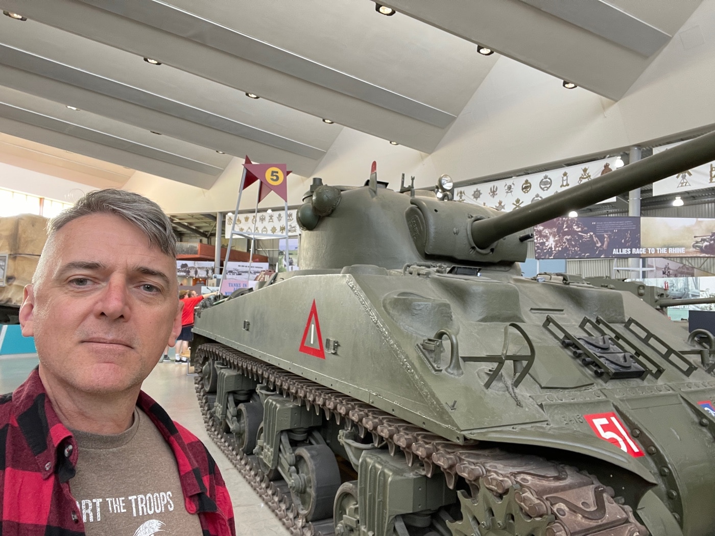 author with Sherman Firefly at Bovington Tank Museum in UK