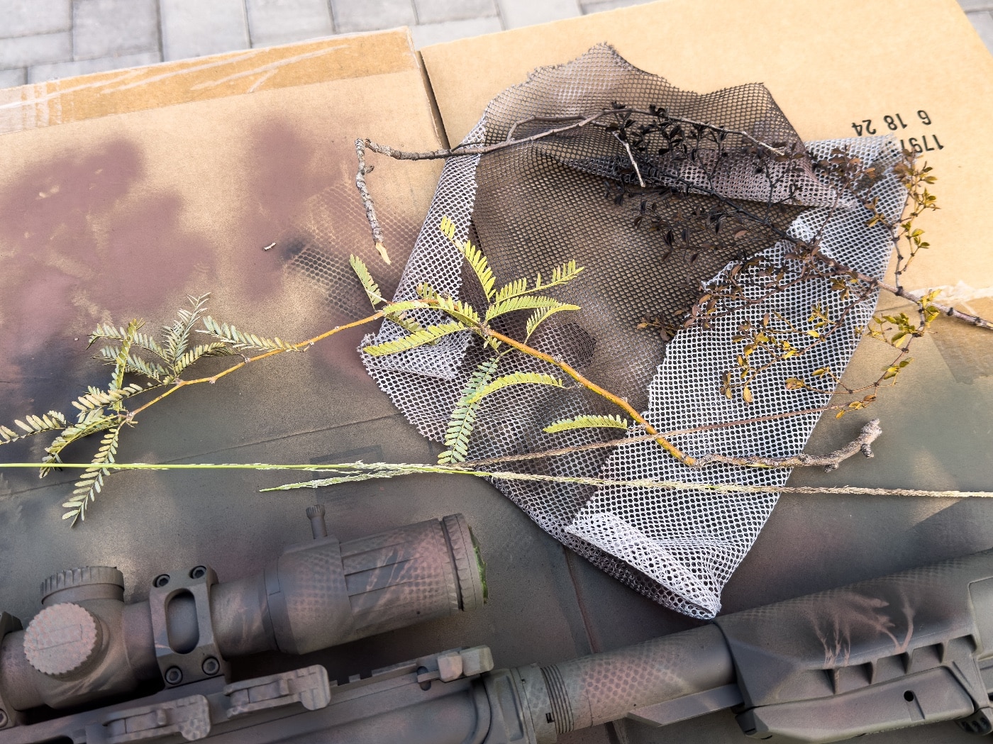 materials for creating camo paint patterns on rifle