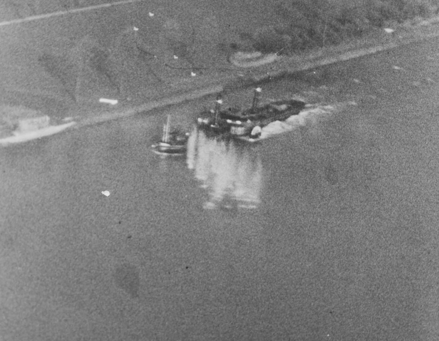 A P-47 Thunderbolt conducts an attack on a river boat in France in 1944, effectively targeting an enemy supply route. The image captures the aircraft’s role in tactical missions that disrupted critical logistical operations. With its heavy armament, the Thunderbolt was capable of delivering precise and devastating strikes. This scene highlights the coordination required for air-to-ground operations during World War II. Such missions were a vital component of Allied strategy in Europe.