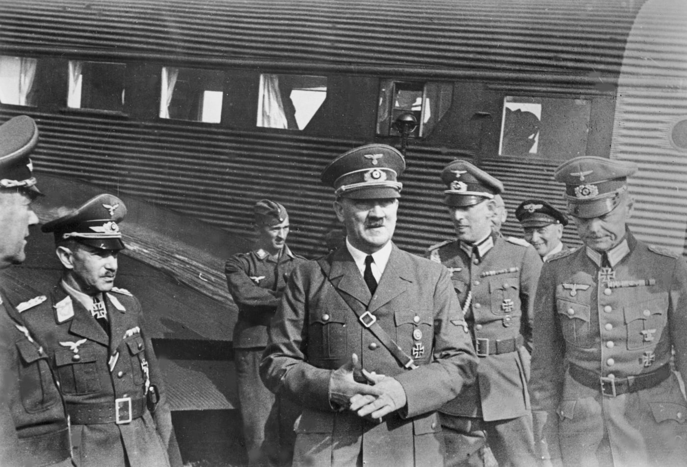 Adolph Hitler next to Junkers Ju 52 airplane