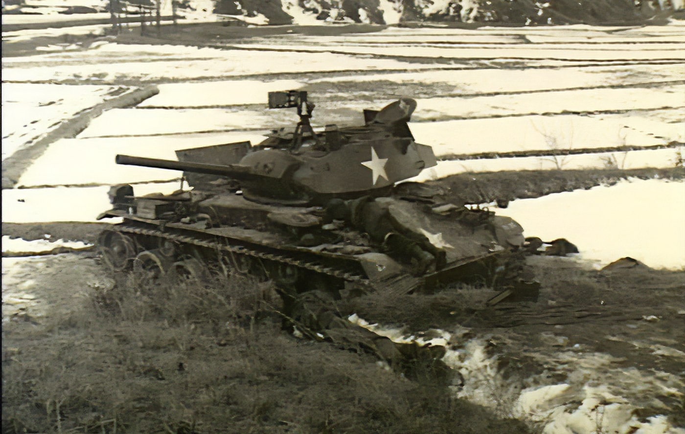 Australian soldiers recover American M24 Chaffee tank during the Korean War