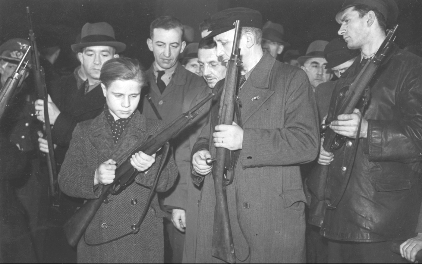 German children and elderly men join Volkssturm armed with Mannlicher 6.5x33mmR carbines