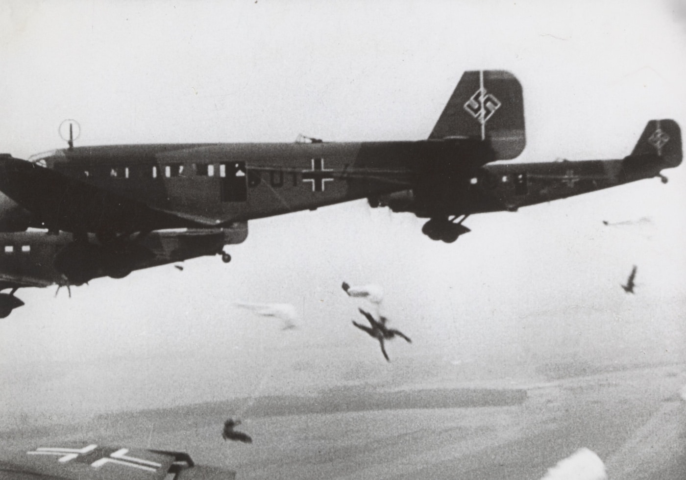 German paratroopers jump from Ju 52 planes during the German invasion of the Netherlands