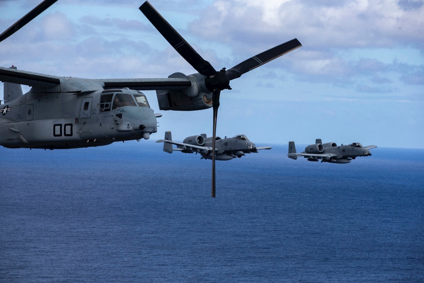 USAF A-10 Thunderbolts escort USMC Marines on MV-22B Osprey aircraft