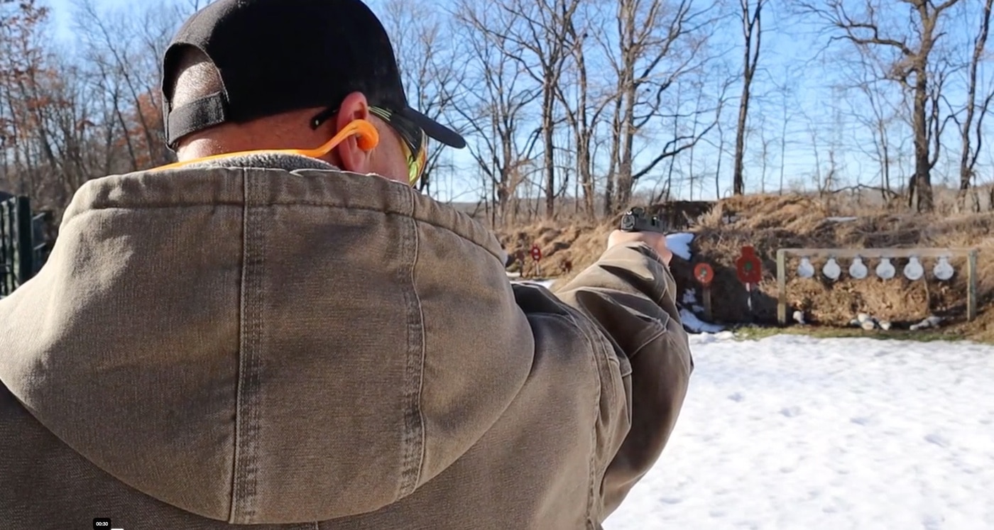 author shooting the RDP at a snow covered shooting range