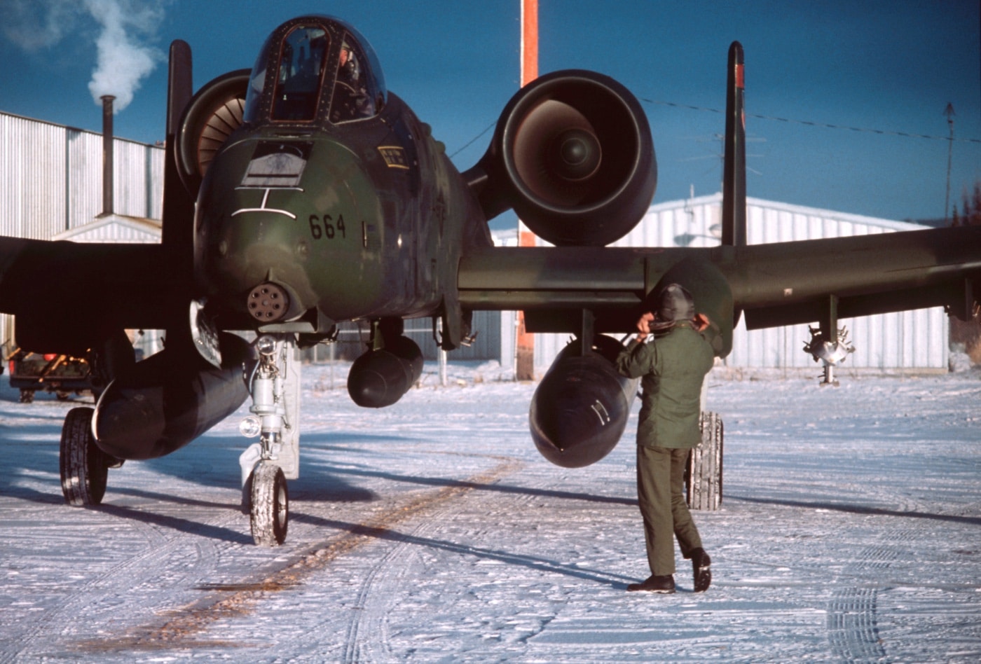 ground crew chief marshals an A-10 Thunderbolt into a parking position during Exercise Brim Frost 81