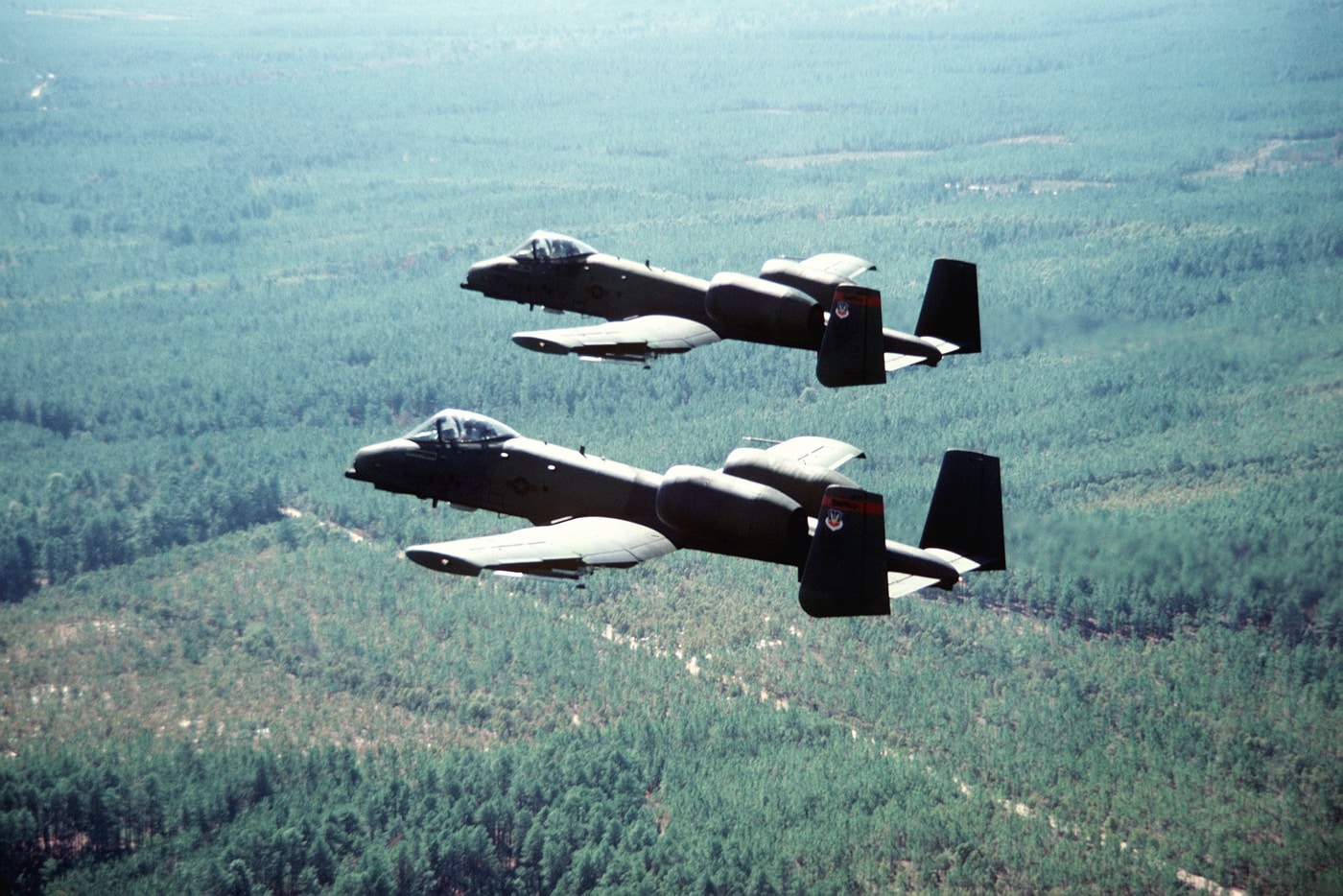 two Fairchild Republic A-10 Warthog planes fly in formation in 1980