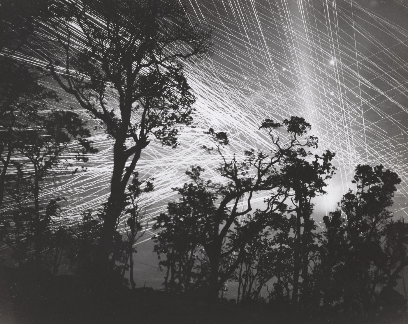 Japanese bombers are engaged by anti-aircraft guns during the Battle of Cape Gloucester