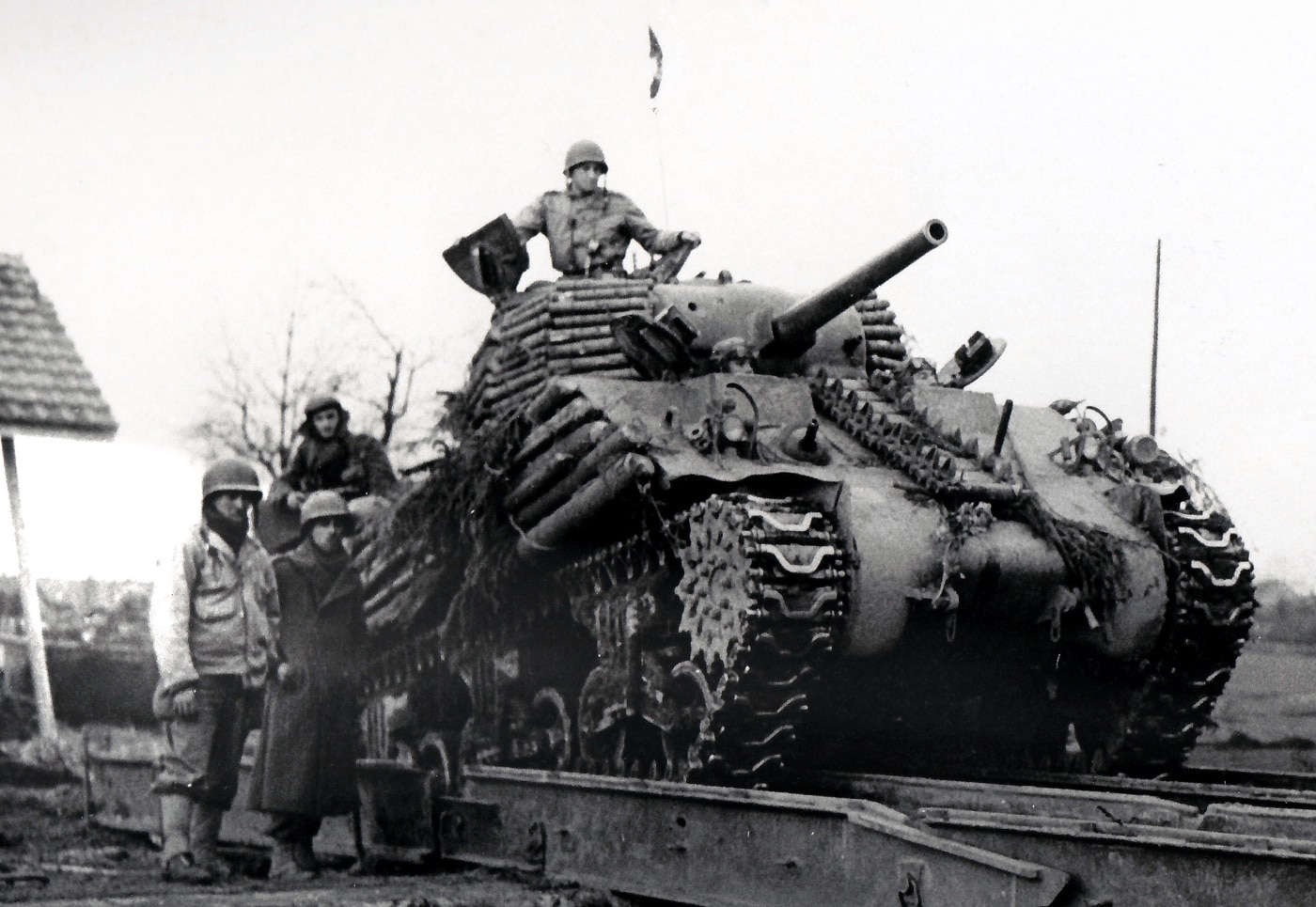 M4A3 Sherman covered in logs for additional protection