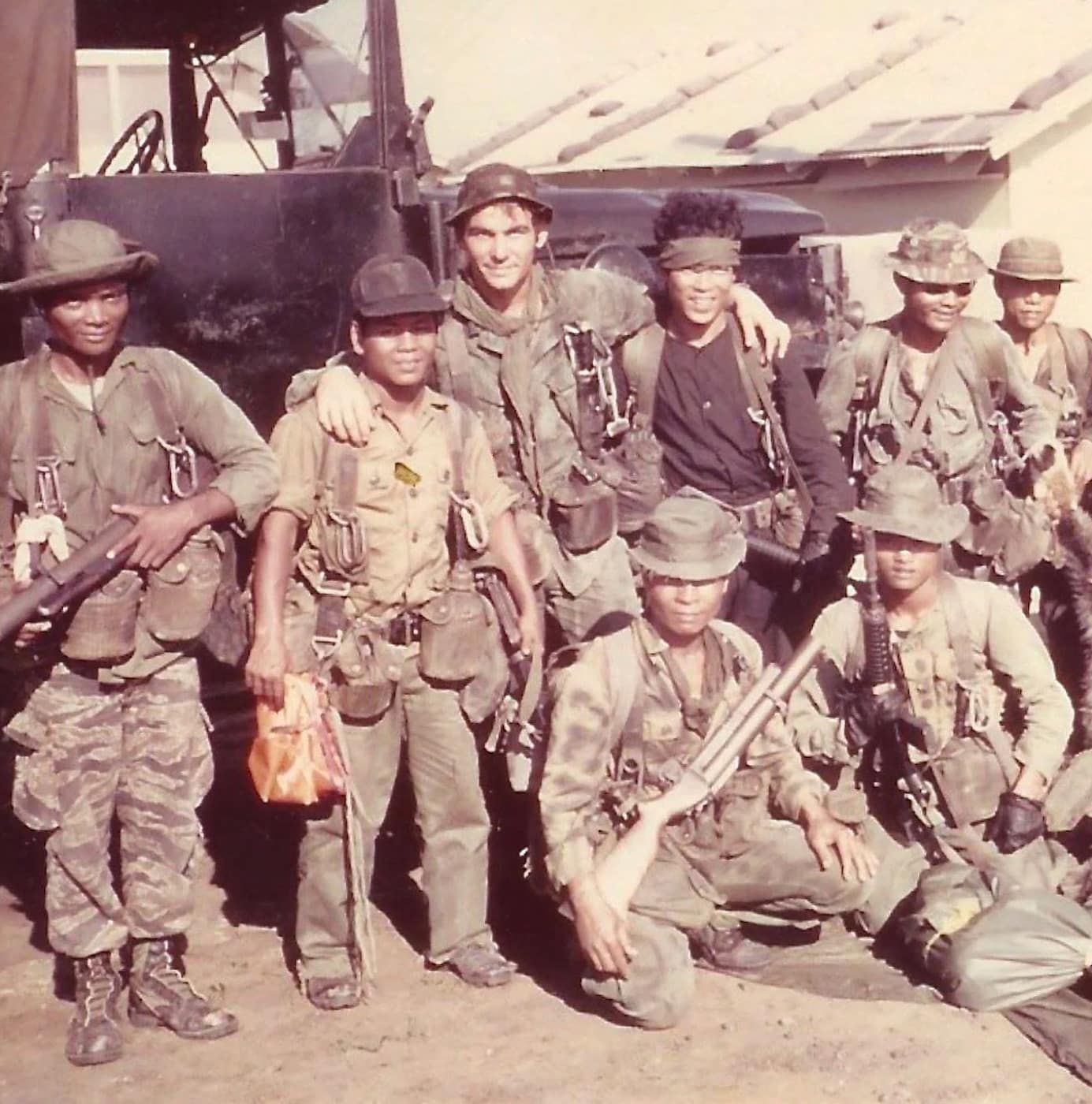 MACV-SOG Trooper with SOG knife and indigenous teammates photo US Army