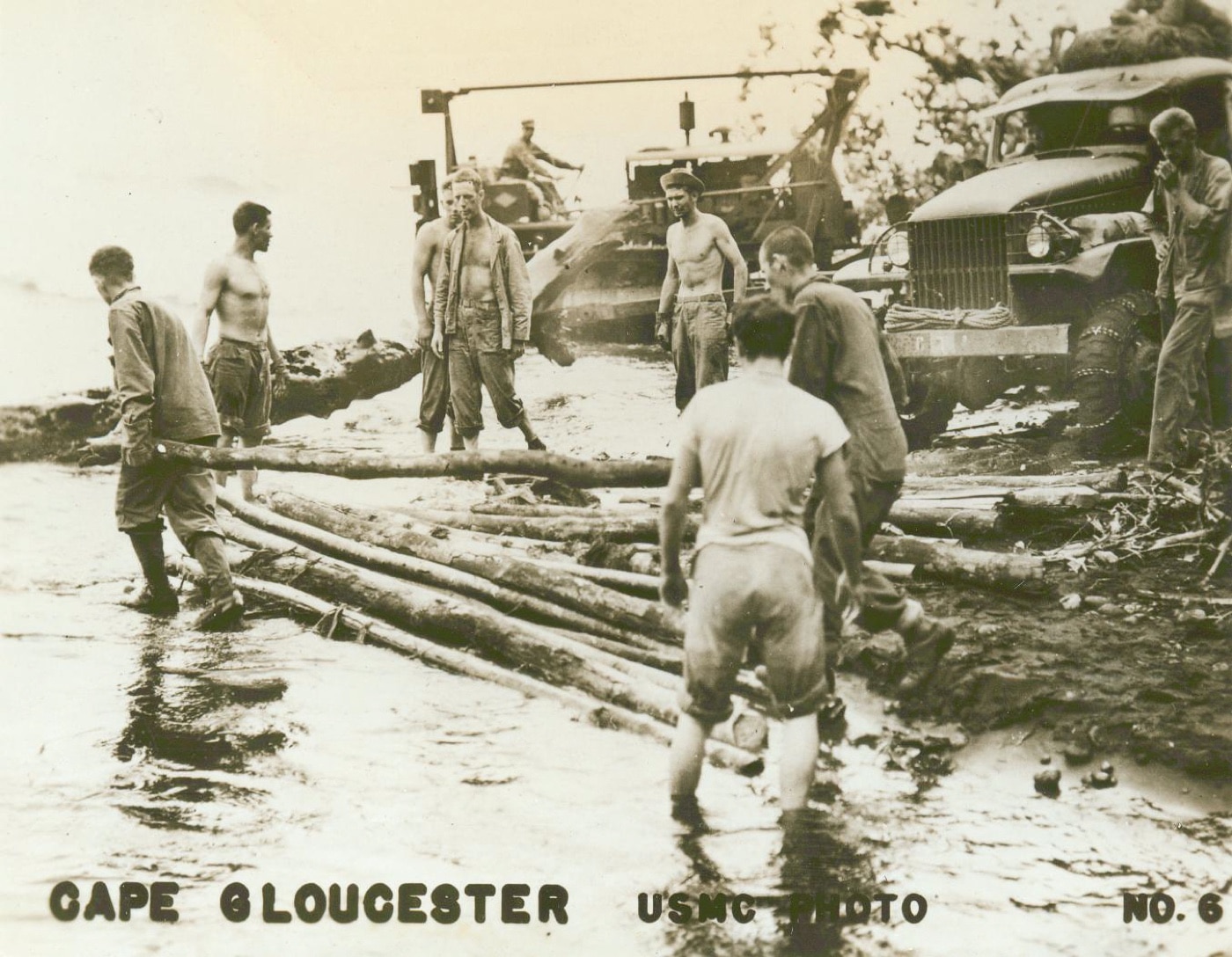 Marine engineers work to build a river crossing