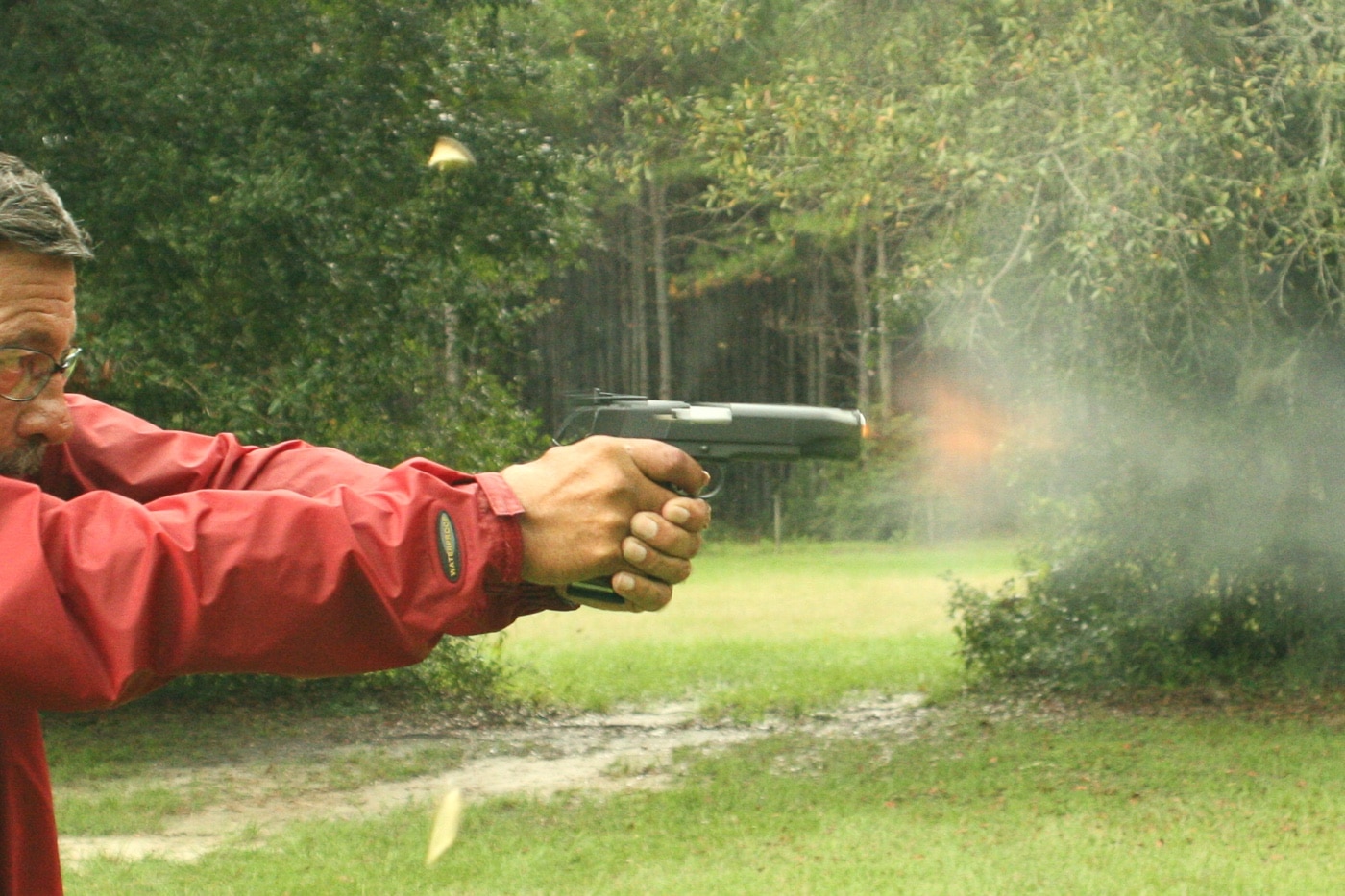 Massad Ayoob shooting a Springfield Armory 1911 semi-automatic pistol at range