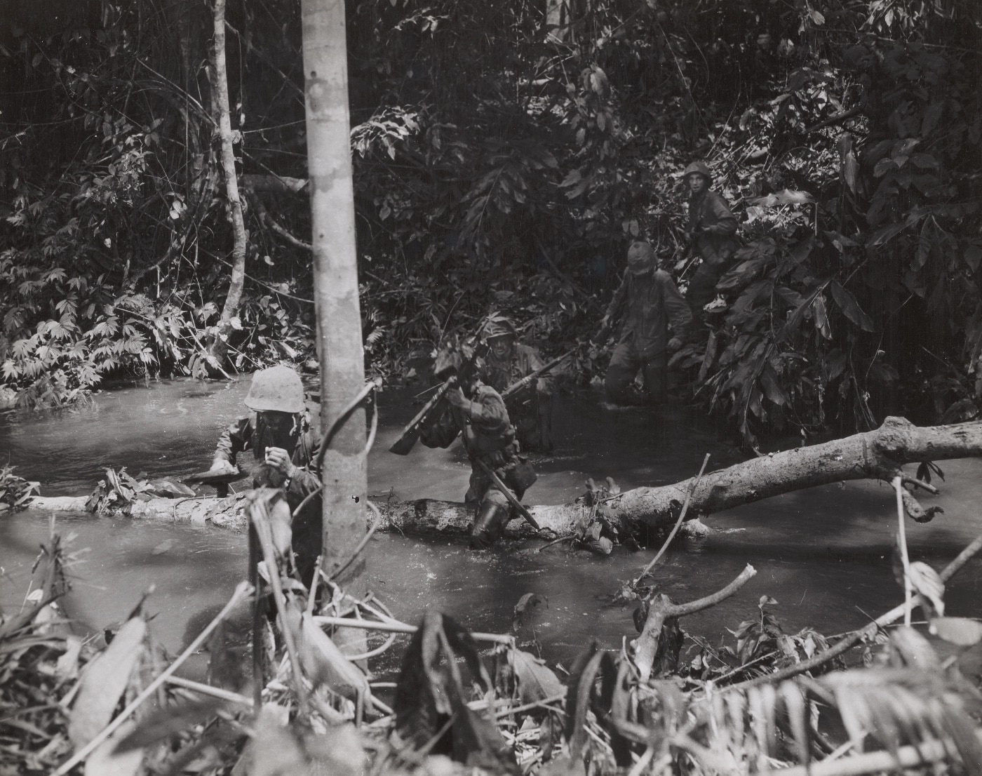 US Marines ford a stream on Cape Gloucester