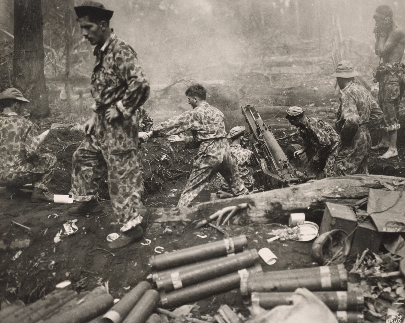 US Marines man a 75mm M116 howitzer during the Battle for Cape Gloucester