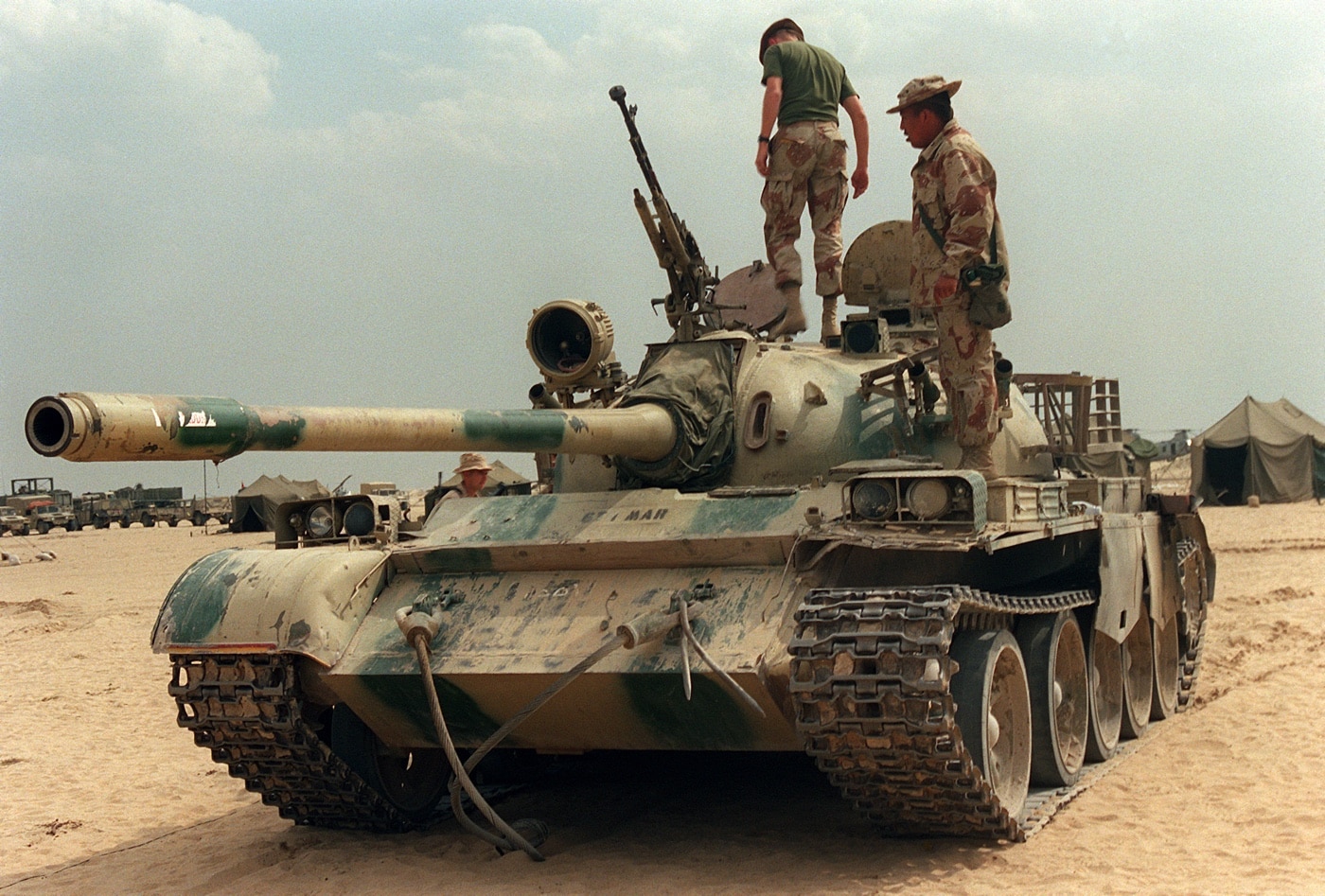 USMC Marines examine a captured Type 59 tank in Kuwait