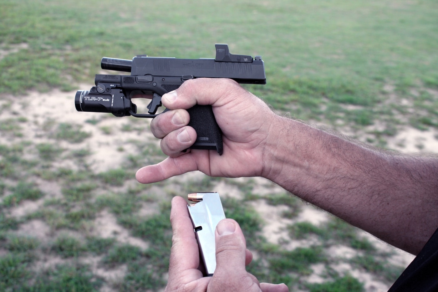 loading a 10 round magazine in a 9x19mm Parabellum semi-automatic pistol