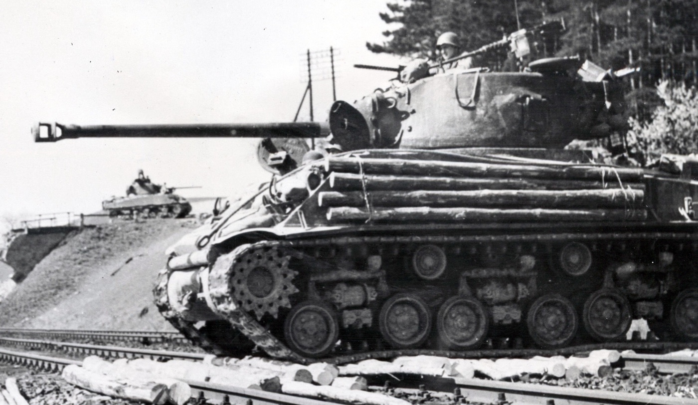 logs used as armor on M4A3E8 Sherman tank