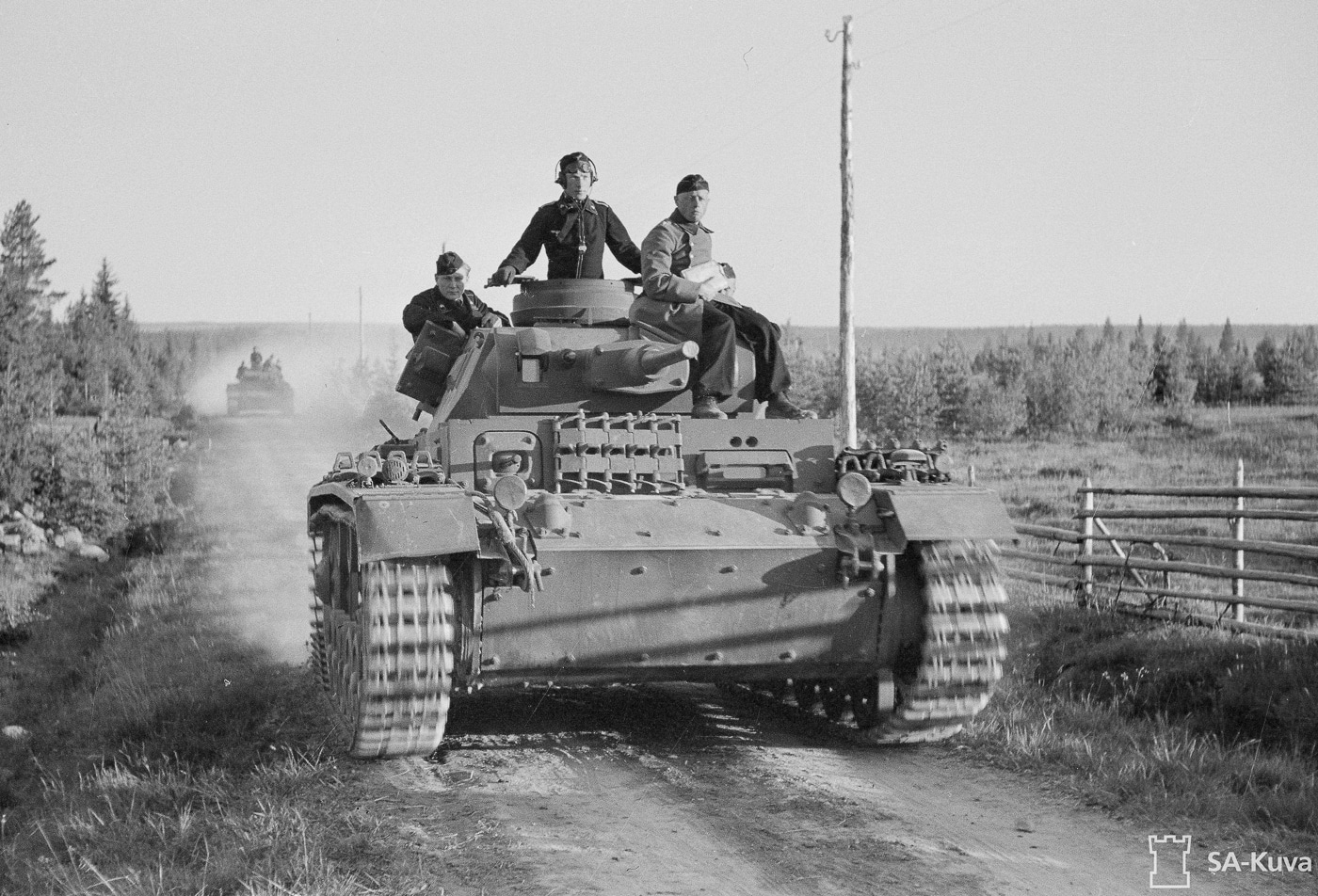 This image shows a German Panzer III tank, also known as Panzerkampfwagen III or pz iii, advancing toward the front line during the Continuation War against the Soviet Union. The tank’s robust turret, main armament, and advanced armor reflect the high engineering standards of Rheinmetall and the mechanized might of German armored forces. Its movement echoes the swift tactics of blitzkrieg and the strategic maneuvers employed by panzer divisions and mechanized troops during World War II. The composition emphasizes the interplay between technology and combat on the Eastern Front, reminiscent of encounters with kv-1 heavy tanks and other formidable armored vehicles. This portrayal captures a key moment in history, highlighting the evolution of armored warfare and the legacy of Nazi Germany’s panzers in battle.