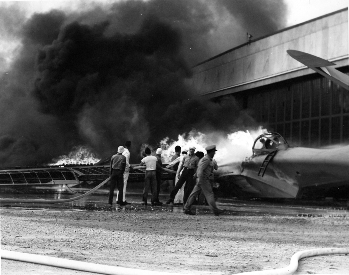 PBY Catalina of VP-11 on fire at NAS Kaneohe Pearl Harbor