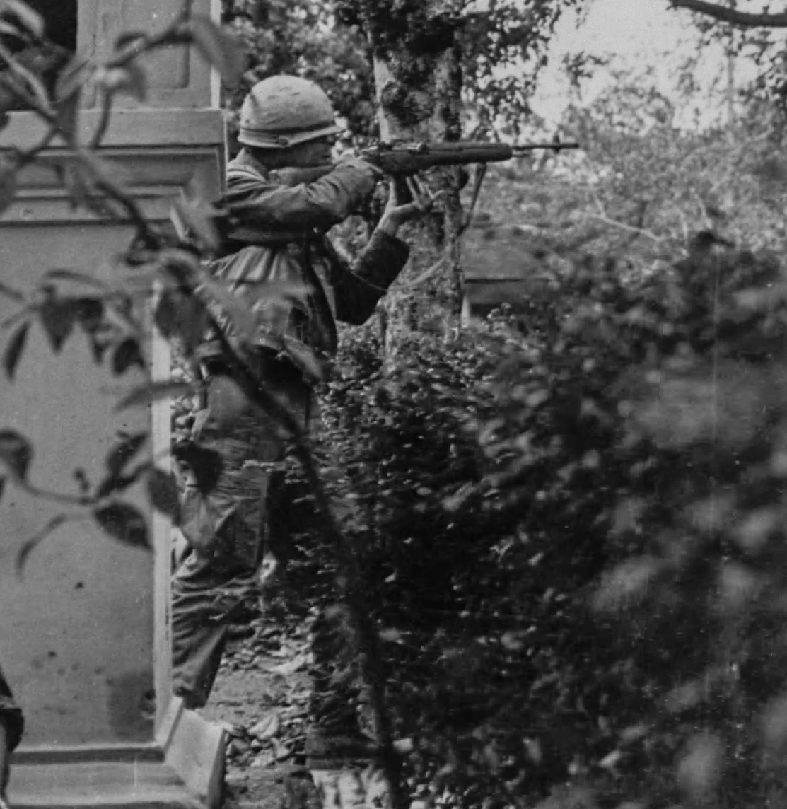 US Marine fires at NVA sniper during Battle of Hue City