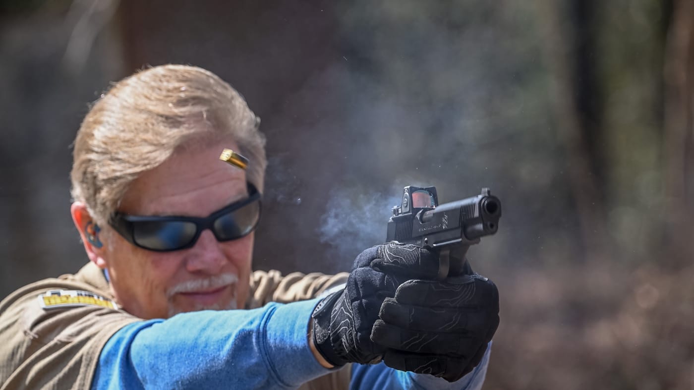 author shooting Springfield Armory TRP AOS during this review